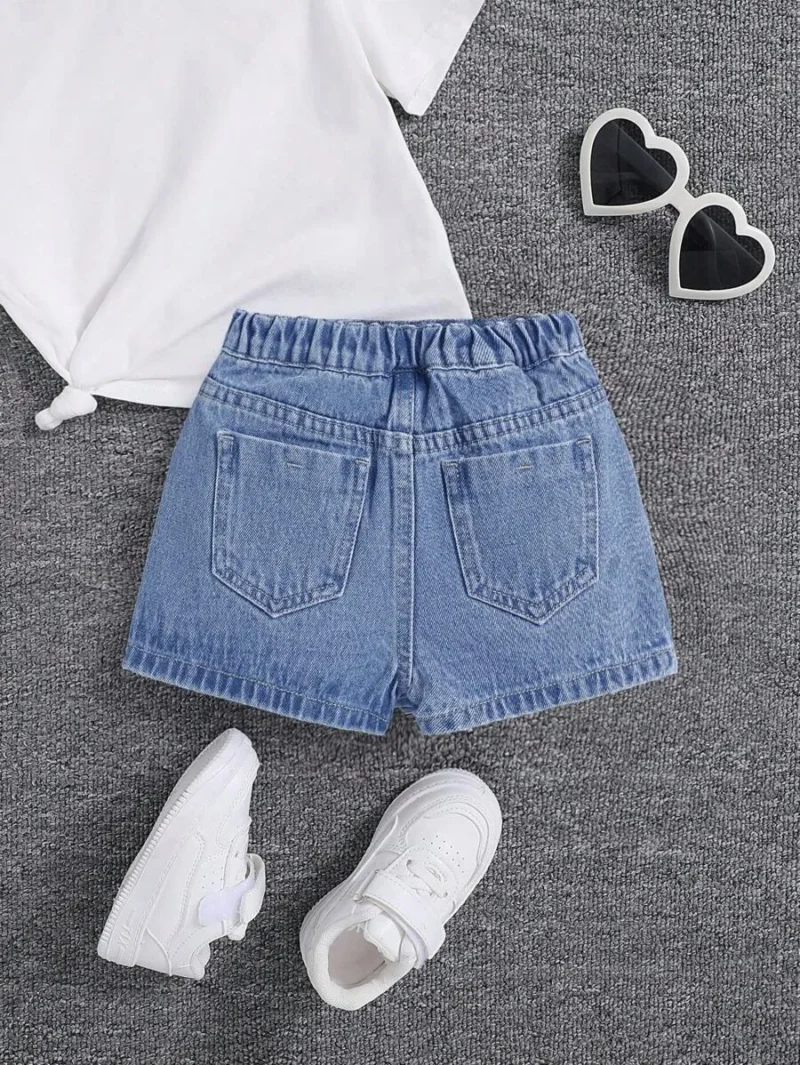 Front Button Wrap Cross Asymmetric Hem Solid Color Denim Shorts