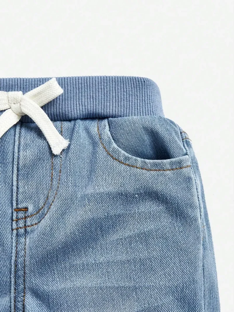 Light Blue Washed Denim Jeans With Bowknot Belt